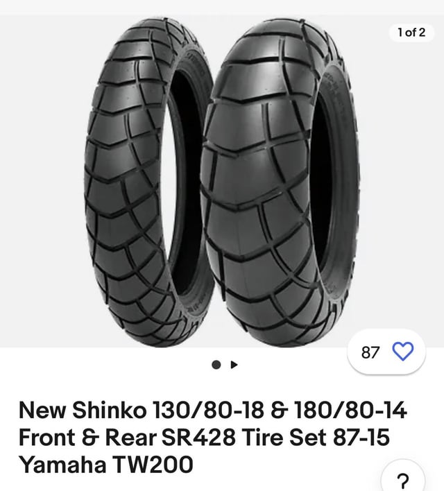 A pair of Shinko SR428 dual sport tires, one in front and one in rear.