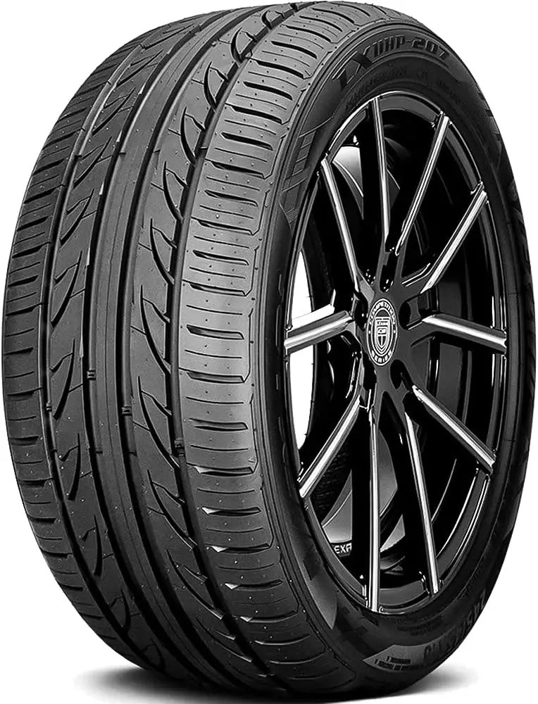 A close-up image of a Lexani LX-UHP 207 high-performance tire mounted on a black alloy wheel.